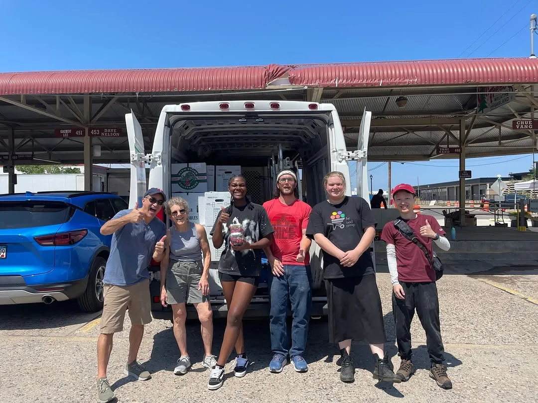 Volunteering at farmers' market