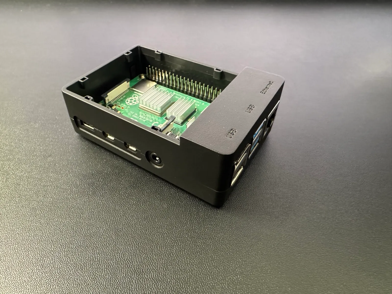 The Raspberry Pi 4 with a case.
